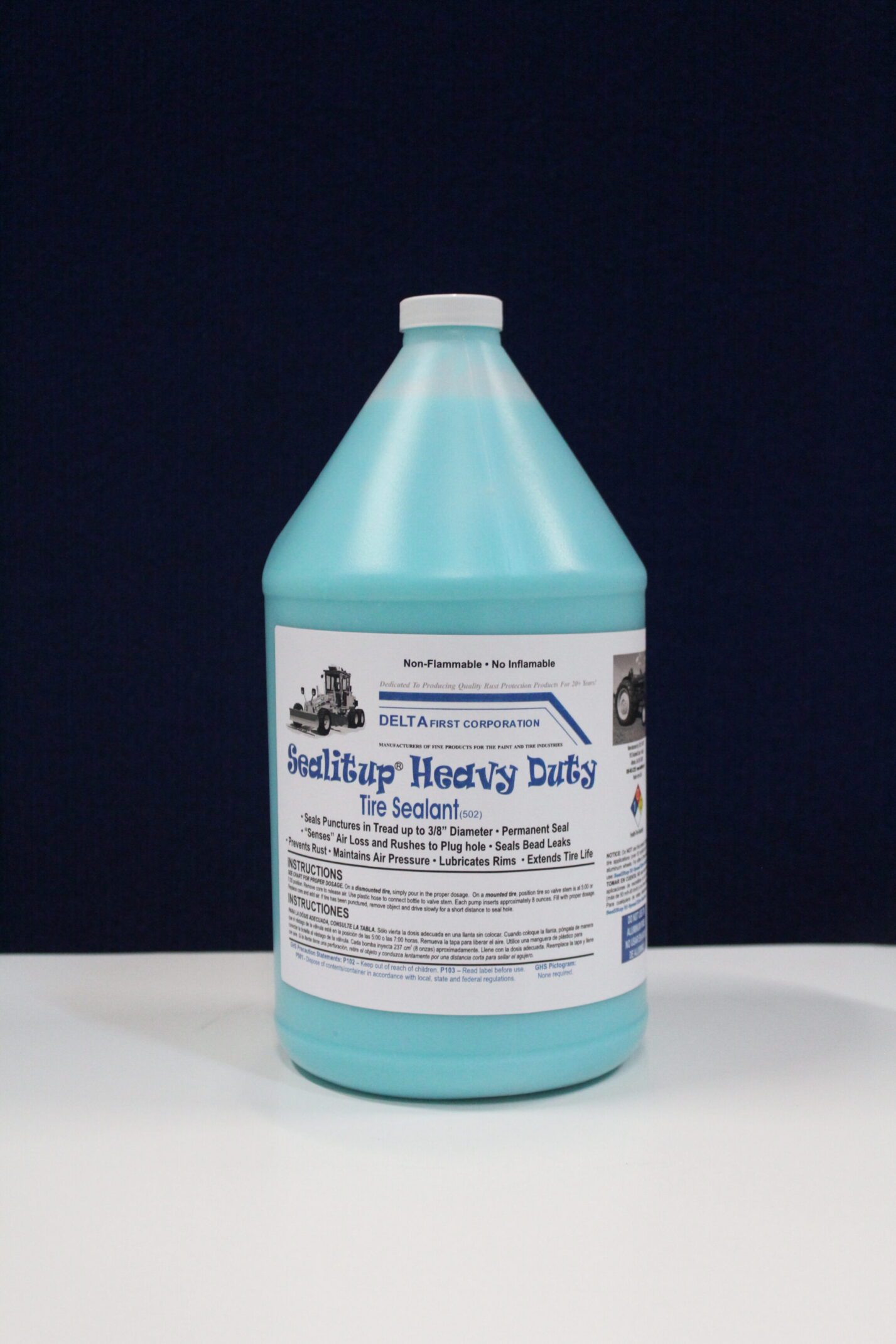 Blue gallon bottle of heavy duty tire sealant
